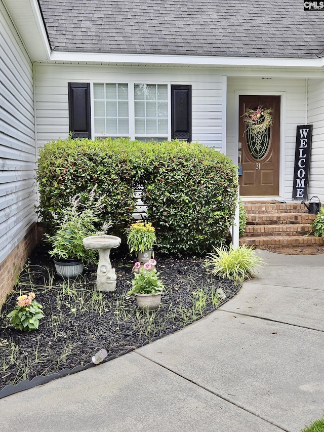 31 Scarlett Ln, Camden, SC 29020 - property entrance with roof with shingles