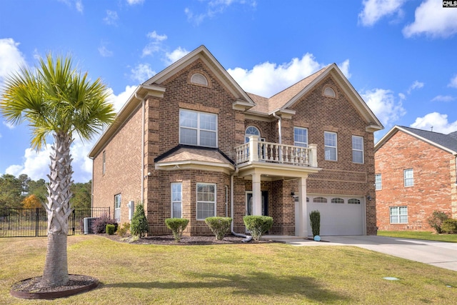 680 Curlew Cir, Sumter, SC 29150 - view of front of home with a balcony, brick siding, driveway, an attached garage, and cooling unit