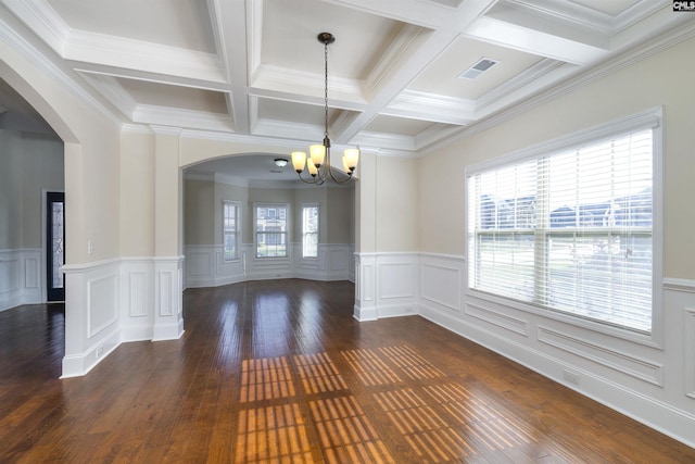 680 Curlew Cir, Sumter, SC 29150 - empty room featuring a chandelier, plenty of natural light, arched walkways, coffered ceiling, and beamed ceiling