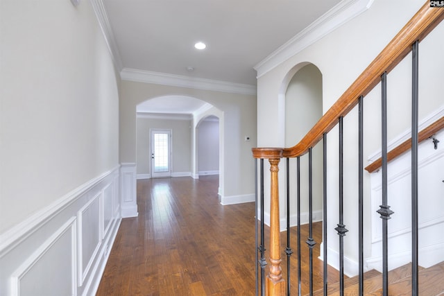 680 Curlew Cir, Sumter, SC 29150 - hall featuring arched walkways, ornamental molding, dark wood-style flooring, and stairway