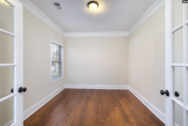 680 Curlew Cir, Sumter, SC 29150 - unfurnished room featuring dark wood finished floors, ornamental molding, and baseboards