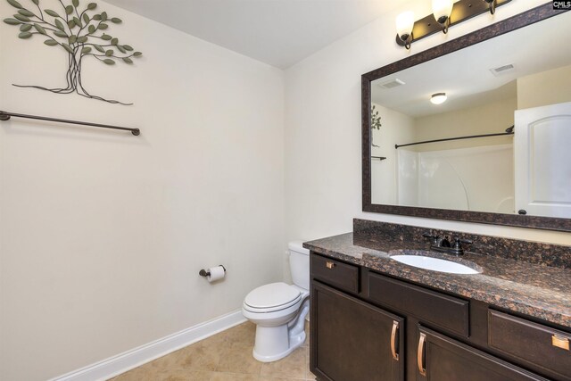 680 Curlew Cir, Sumter, SC 29150 - bathroom featuring toilet, baseboards, tile patterned floors, vanity, and a shower