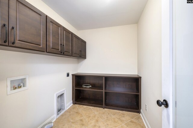 680 Curlew Cir, Sumter, SC 29150 - clothes washing area featuring cabinet space, electric dryer hookup, hookup for a washing machine, and baseboards