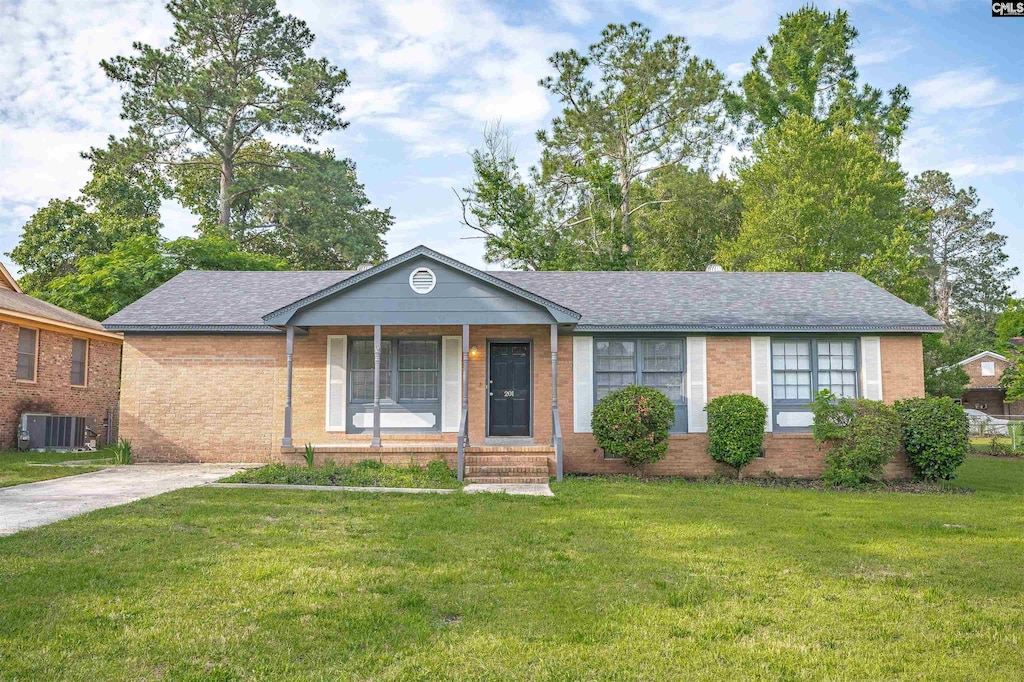 201 Kildare Dr, Columbia, SC 29209 - ranch-style home with a front yard, covered porch, brick siding, and cooling unit