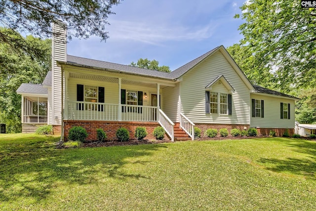 1240 Windmill Rd, Leesville, SC 29070 - ranch-style home featuring a chimney, a porch, a front yard, and roof with shingles