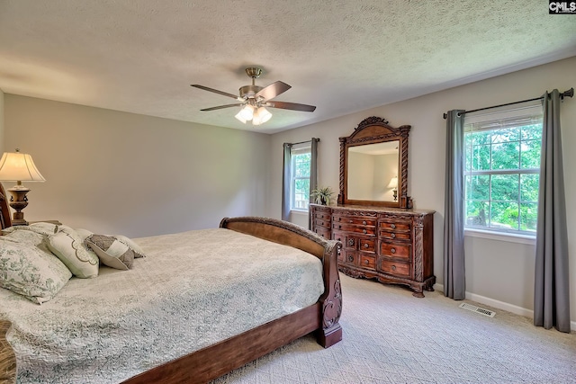 1240 Windmill Rd, Leesville, SC 29070 - bedroom with light colored carpet, baseboards, and a ceiling fan