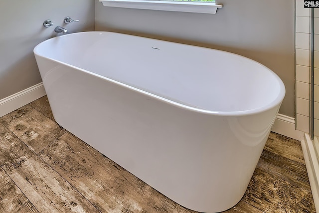 1240 Windmill Rd, Leesville, SC 29070 - bathroom with a freestanding bath and baseboards