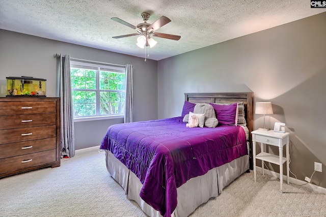 1240 Windmill Rd, Leesville, SC 29070 - carpeted bedroom with a textured ceiling, baseboards, and ceiling fan