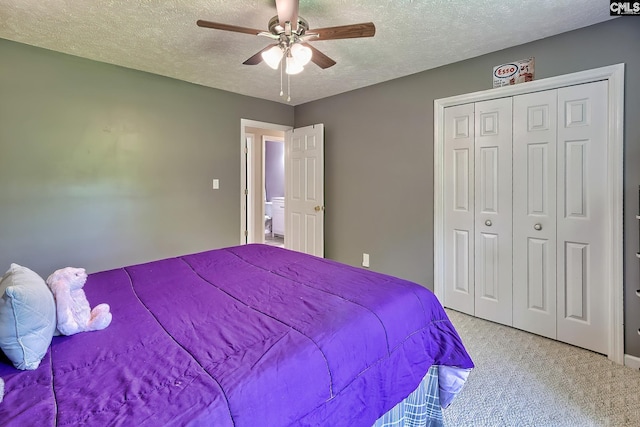1240 Windmill Rd, Leesville, SC 29070 - carpeted bedroom with a textured ceiling, a closet, and a ceiling fan