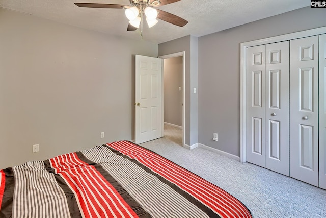 1240 Windmill Rd, Leesville, SC 29070 - carpeted bedroom featuring a closet, baseboards, and ceiling fan