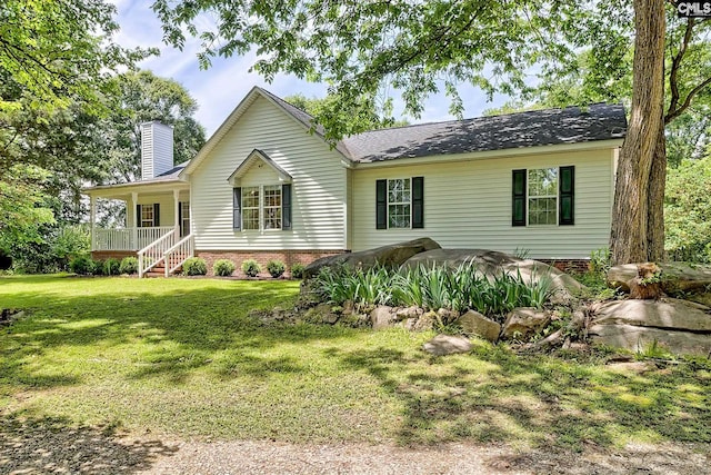 1240 Windmill Rd, Leesville, SC 29070 - single story home featuring a chimney, a front yard, and covered porch