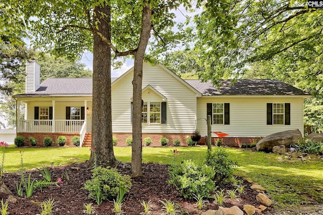 1240 Windmill Rd, Leesville, SC 29070 - single story home featuring a chimney, a front lawn, a porch, and a shingled roof