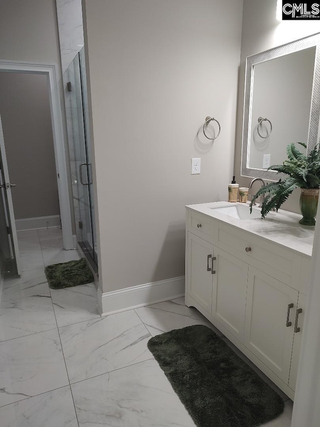 10 Saints Creek Pl, Irmo, SC 29063 - bathroom featuring marble finish flooring, vanity, a stall shower, and baseboards