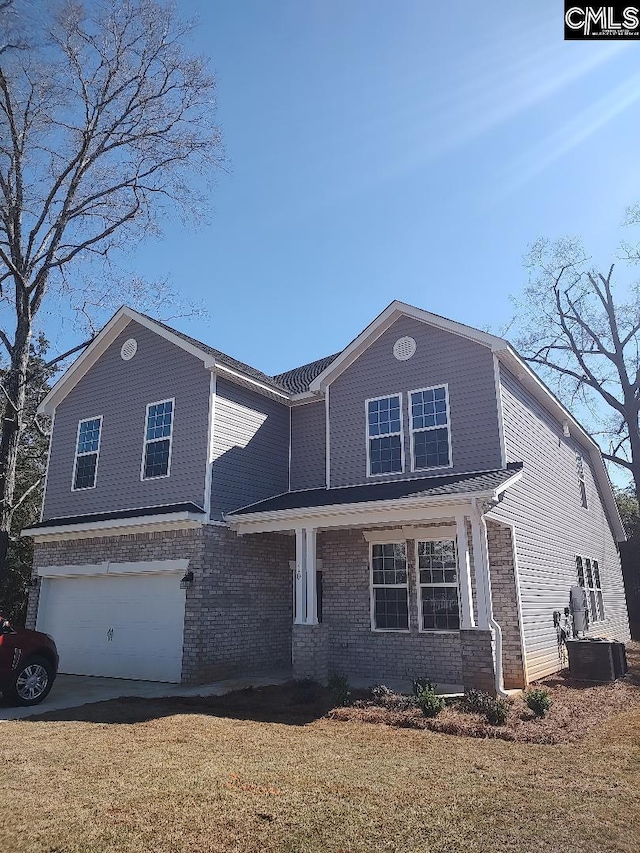 10 Saints Creek Pl, Irmo, SC 29063 - view of front of property with an attached garage, brick siding, a front yard, and central AC unit