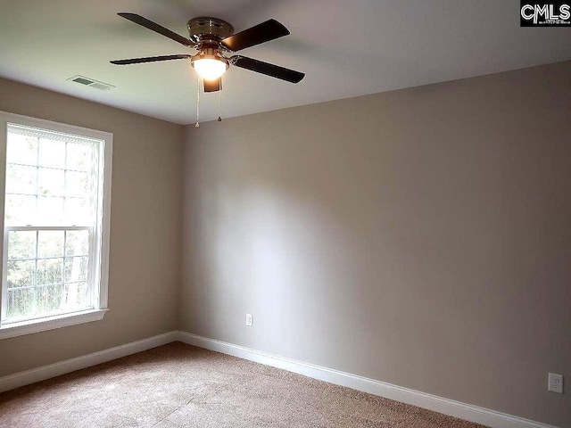10 Saints Creek Pl, Irmo, SC 29063 - unfurnished room featuring a ceiling fan, light carpet, baseboards, and healthy amount of natural light