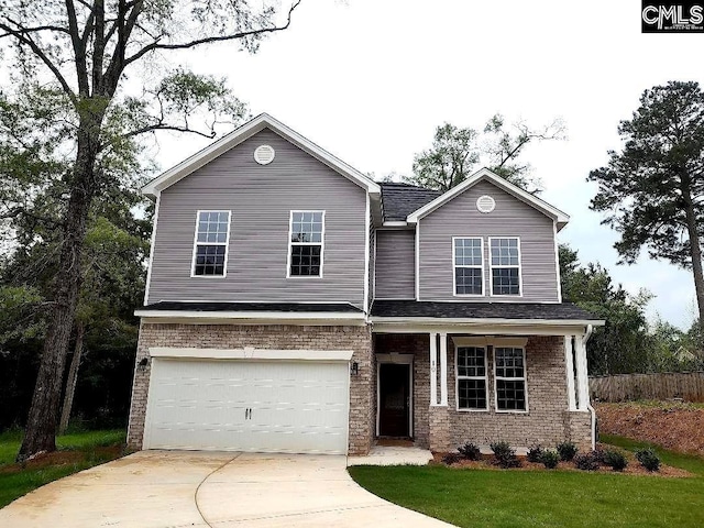 10 Saints Creek Pl, Irmo, SC 29063 - view of front facade featuring a garage, driveway, and brick siding