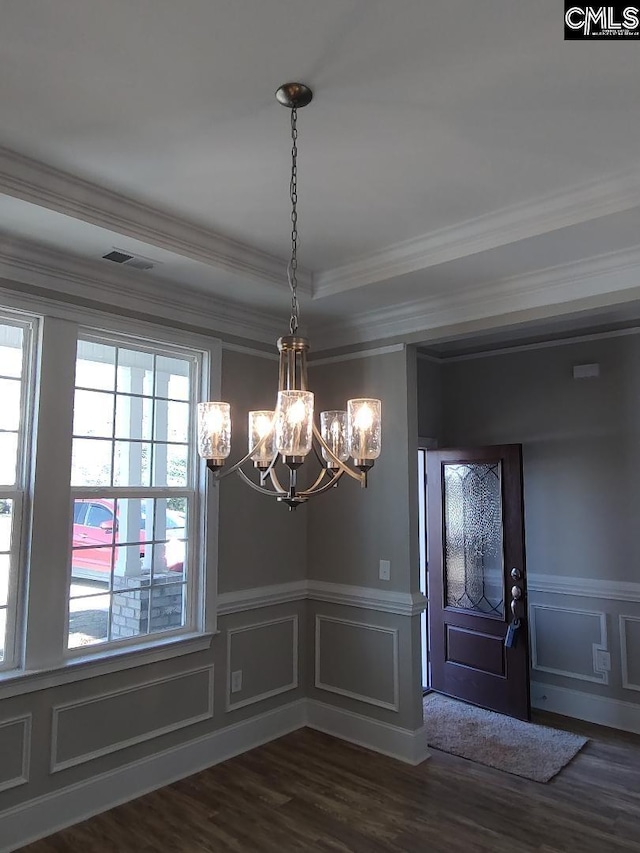 10 Saints Creek Pl, Irmo, SC 29063 - unfurnished dining area with a chandelier, dark wood-style floors, crown molding, wainscoting, and a decorative wall