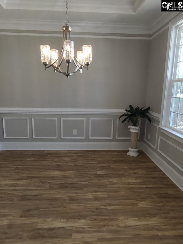10 Saints Creek Pl, Irmo, SC 29063 - unfurnished dining area featuring a chandelier, ornamental molding, dark wood finished floors, a decorative wall, and wainscoting