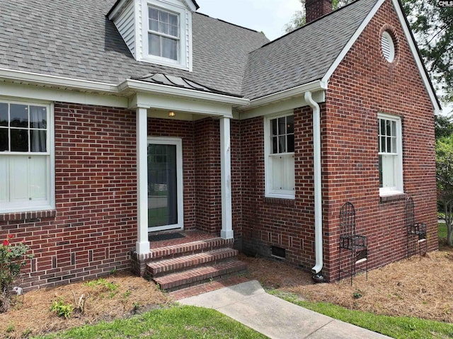 3925 Rosewood Dr, Columbia, SC 29205 - doorway to property featuring brick siding, a chimney, crawl space, and a shingled roof