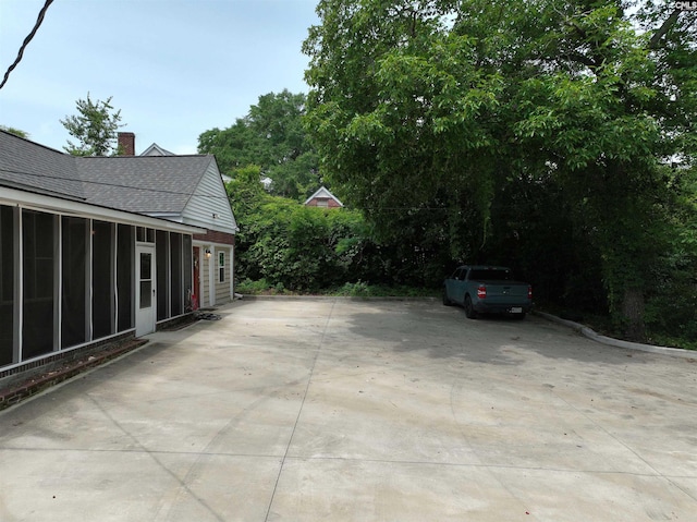 3925 Rosewood Dr, Columbia, SC 29205 - view of patio with a sunroom