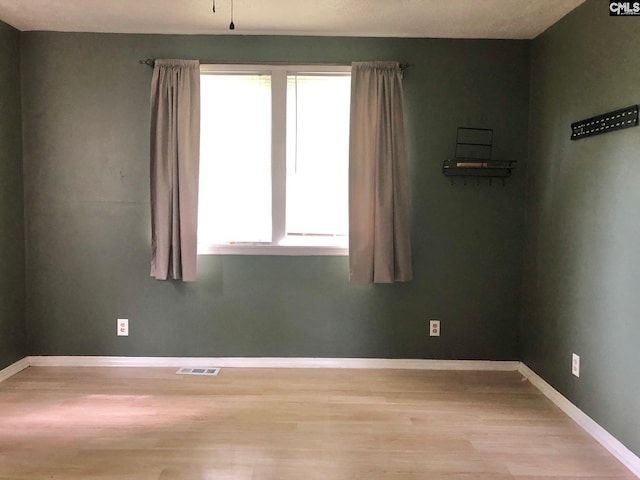 1171 Indian Creek Pt, Saluda, SC 29138 - spare room featuring light wood-type flooring and baseboards