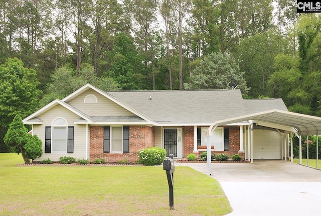 ranch-style home featuring a carport, brick siding, a front yard, an attached garage, and concrete driveway