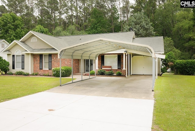 ranch-style home with brick siding, a front yard, and concrete driveway