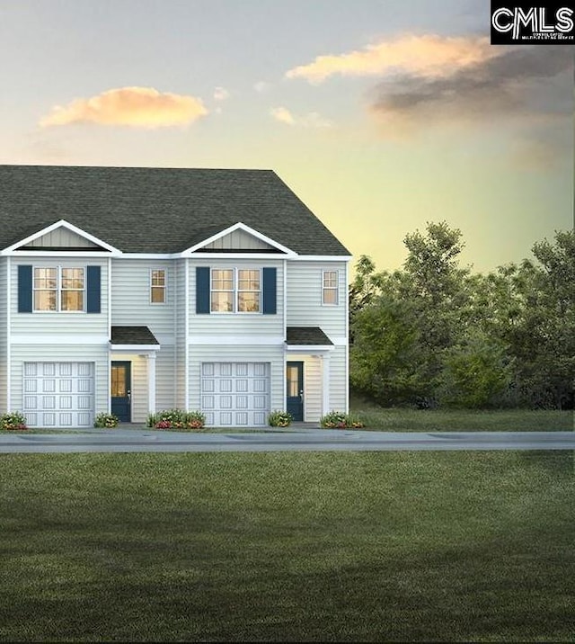 126A Willow Creek Blvd, Lugoff, SC 29078 - multi unit property featuring roof with shingles, an attached garage, a yard, and board and batten siding