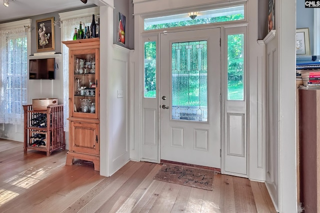 109 Broad Bluff Pt, Irmo, SC 29063 - foyer featuring light wood-type flooring and healthy amount of natural light
