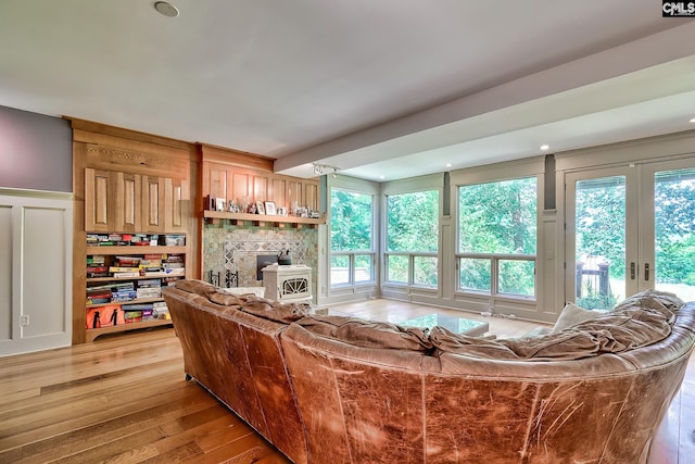 109 Broad Bluff Pt, Irmo, SC 29063 - living area featuring light wood finished floors, healthy amount of natural light, and a decorative wall