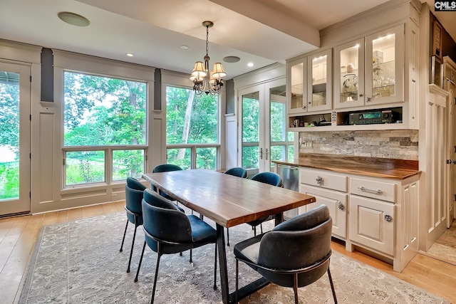 109 Broad Bluff Pt, Irmo, SC 29063 - dining space with light wood-style floors, plenty of natural light, a chandelier, and recessed lighting