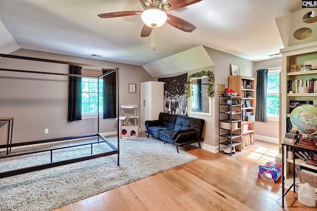 109 Broad Bluff Pt, Irmo, SC 29063 - living room featuring vaulted ceiling, wood finished floors, ceiling fan, and healthy amount of natural light
