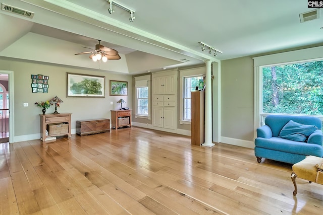 109 Broad Bluff Pt, Irmo, SC 29063 - sitting room with rail lighting, decorative columns, light wood-style flooring, a ceiling fan, and baseboards