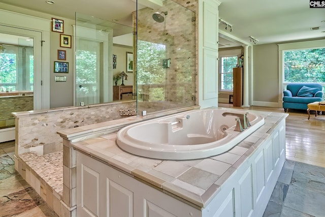 109 Broad Bluff Pt, Irmo, SC 29063 - bathroom with a whirlpool tub and a stall shower