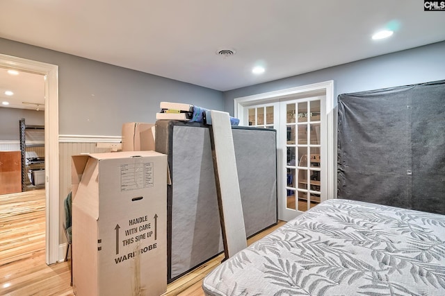 109 Broad Bluff Pt, Irmo, SC 29063 - bedroom with wood finished floors, wainscoting, and recessed lighting