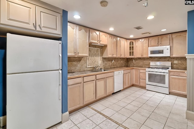 109 Broad Bluff Pt, Irmo, SC 29063 - kitchen featuring white appliances, light brown cabinets, a sink, tasteful backsplash, and light tile patterned flooring