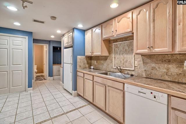 109 Broad Bluff Pt, Irmo, SC 29063 - kitchen featuring white appliances, light brown cabinetry, a sink, light tile patterned flooring, and baseboards