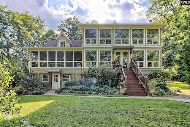 109 Broad Bluff Pt, Irmo, SC 29063 - view of front of house featuring a sunroom, stairway, a front yard, and french doors