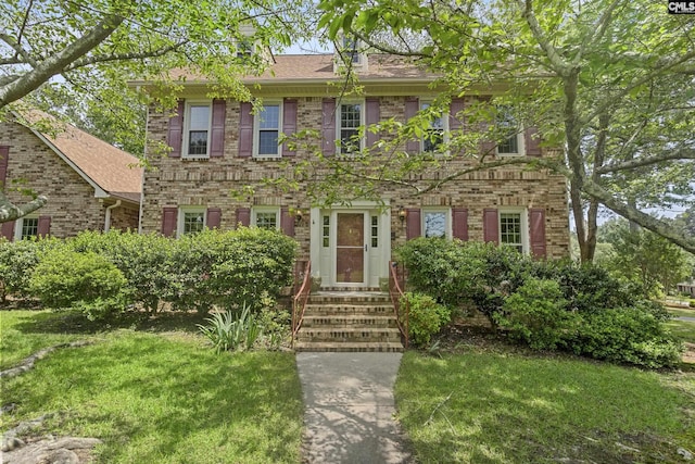 228 Brookspring Rd, Columbia, SC 29223 - colonial home with a front lawn, entry steps, and brick siding