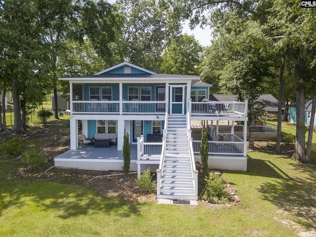 1513 Molly Creek Cir, Ridgeway, SC 29130 - back of house with outdoor lounge area, stairway, and a yard