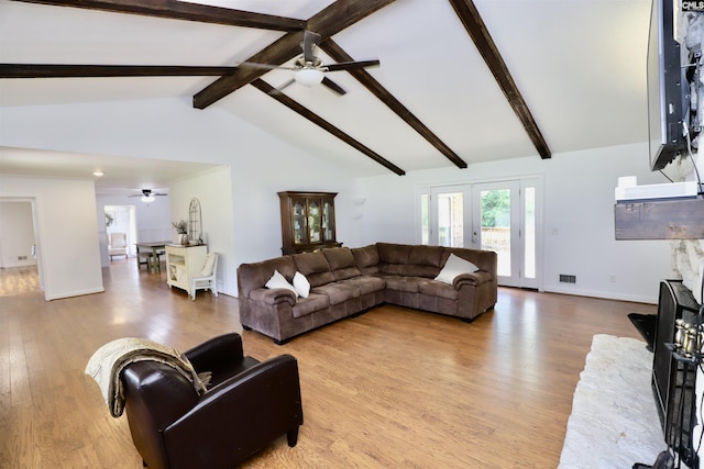 805 Mcrae Rd, Camden, SC 29020 - living room with ceiling fan, wood finished floors, beamed ceiling, baseboards, and high vaulted ceiling