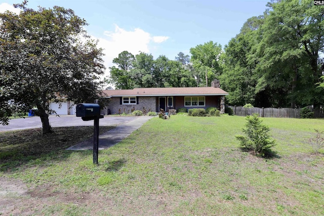 805 Mcrae Rd, Camden, SC 29020 - ranch-style house featuring a chimney and driveway