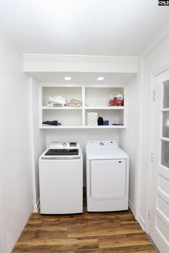 805 Mcrae Rd, Camden, SC 29020 - laundry room featuring washing machine and clothes dryer, crown molding, and wood finished floors
