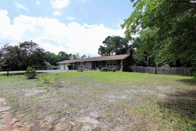 805 Mcrae Rd, Camden, SC 29020 - view of front of house with a garage, a chimney, and driveway