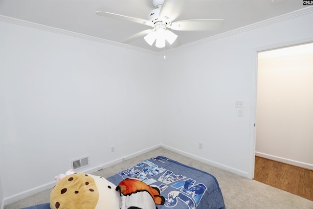 805 Mcrae Rd, Camden, SC 29020 - bedroom with carpet floors, ornamental molding, baseboards, and a ceiling fan