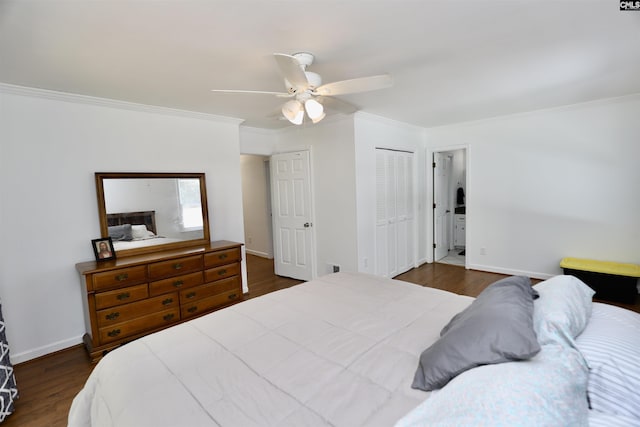 805 Mcrae Rd, Camden, SC 29020 - bedroom featuring ornamental molding, dark wood-style flooring, baseboards, a ceiling fan, and a closet