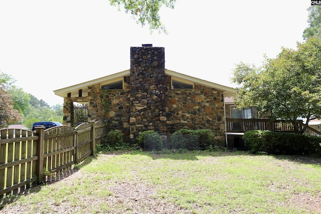 805 Mcrae Rd, Camden, SC 29020 - rear view of house with a chimney and stone siding