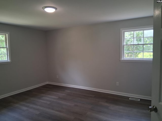 1904 Elise Rd, Columbia, SC 29210 - spare room with dark wood-type flooring and baseboards