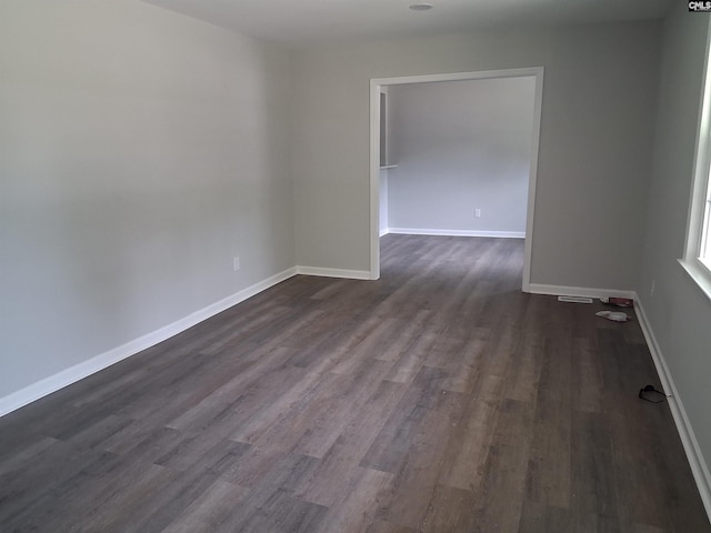1904 Elise Rd, Columbia, SC 29210 - spare room with dark wood-style flooring and baseboards