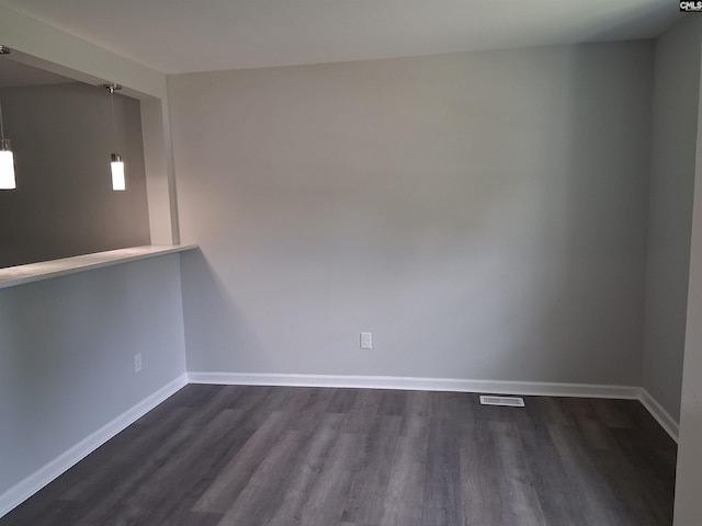 1904 Elise Rd, Columbia, SC 29210 - empty room with dark wood-style floors and baseboards